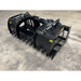 Black steel grapple attachment with multiple pointed tines, two hydraulic cylinders, and reinforced frame on concrete floor