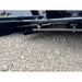 Close-up of Stinger Attachments TF5 Twister skid steer brush cutter showing underside deck and blade mount, gallery position 3.