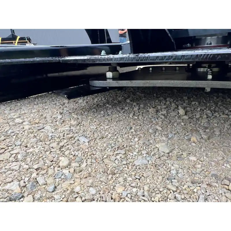Close-up of Stinger Attachments TF5 Twister skid steer brush cutter showing underside deck and blade mount, gallery position 3.