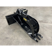 Black metal skid steer stump grapple attachment with three claw teeth and hydraulic cylinder on concrete floor