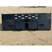 Wide black steel snow bucket attachment with mounting brackets and vent slots on gravel surface