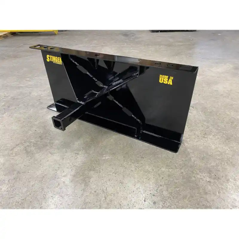 Black steel receiver hitch attachment with reinforced triangular bracing and hollow square tongue on concrete surface