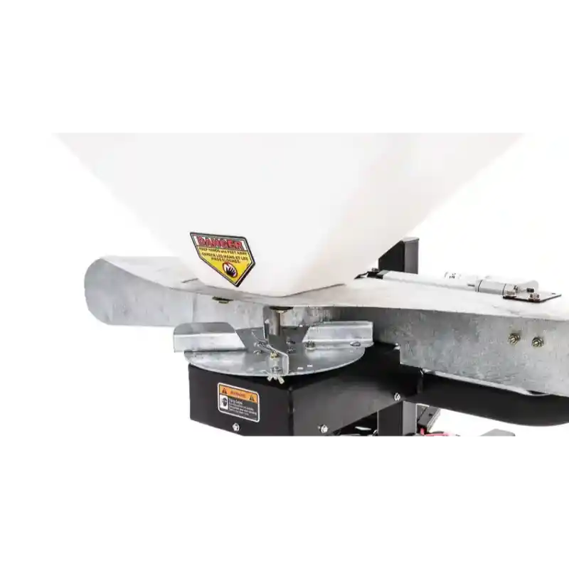 Close-up of PTO shaft mounting and spinner plate on Swisher Commercial Truck Spreader, gallery position 1