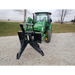 Stinger Attachments STP Tractor Tree Puller attached to green tractor, gallery image 11, 800x800 square view