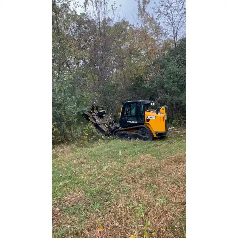 JCB skid steer with Stinger Attachments TF3 Twister brush cutter clearing vegetation in wooded area, gallery position 24, 800x800.