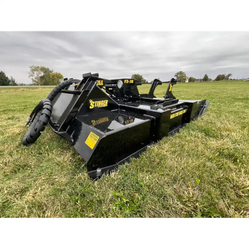 Stinger Attachments TF3 Twister skid steer brush cutter on grass with hydraulic hose connection, gallery position 9, 800x800 square image