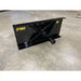Black metal receiver hitch attachment plate with welded cross braces and mounting point on concrete floor