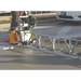MBW Modular Vibratory Truss Screed section leveling freshly poured concrete on road surface, gallery position 1