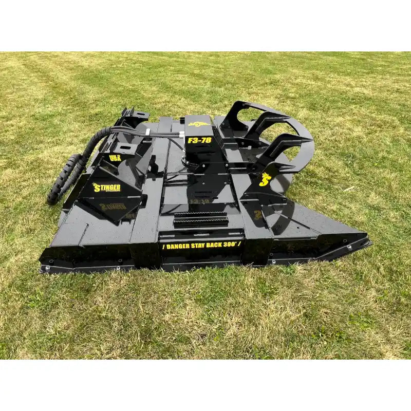 Stinger Attachments TF3 Twister skid steer brush cutter on grass, square 800x800 image, gallery position 25