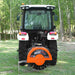 rear view of orange MechMaxx SG30PRO 3-point PTO stump grinder attached to tractor at gallery position 1