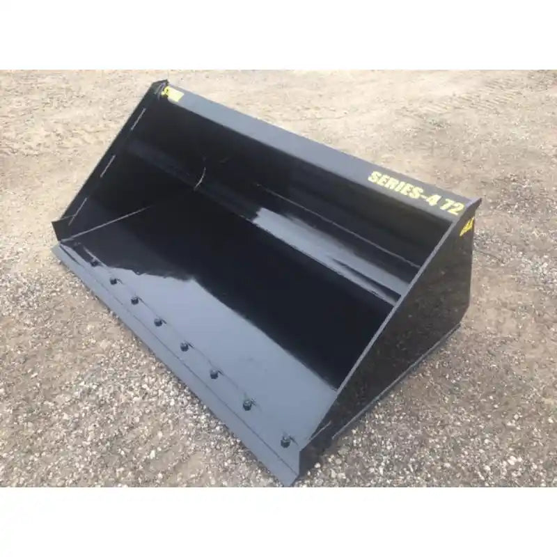 Front-left angled view of a black steel skid steer material bucket with smooth interior and bolt-on cutting edge on gravel ground