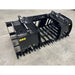 Black steel tractor root and rock grapple attachment with dual hydraulic cylinders and reinforced tines on concrete floor