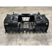 Black skid steer grapple attachment with dual hydraulic cylinders, wide spaced tines, and reinforced teeth on concrete floor