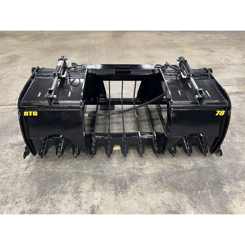 Black steel grapple attachment with hydraulic cylinders, serrated tines, and reinforced arms on concrete floor