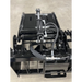 Black skid steer grapple attachment with hydraulic cylinder, reinforced frame, and steel mounting bracket on concrete floor