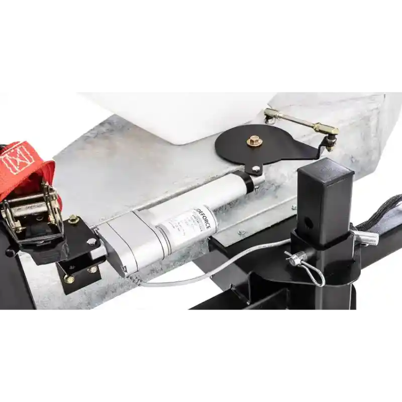 Close-up of electric actuator assembly and linkage on metal frame of Swisher salt spreader, gallery position 1