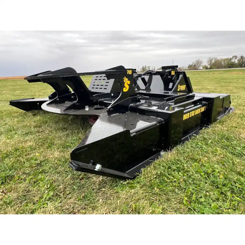 Stinger Attachments TF4 Twister skid steer brush cutter on grass, gallery position 4, 800x800 square image