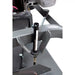 Close-up of height adjustment gauge and locking lever on Swisher 60-inch finish cut mower, gallery position 1
