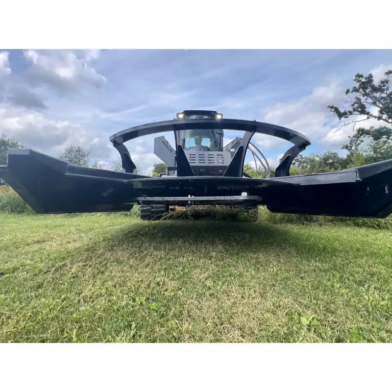 Front low-angle view of Stinger Attachments TF5 Twister skid steer brush cutter on grass, gallery position 6, 800x800 square