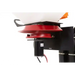 Close-up of red spinner assembly and black electric vibrator motor mounted beneath white hopper, gallery position 1
