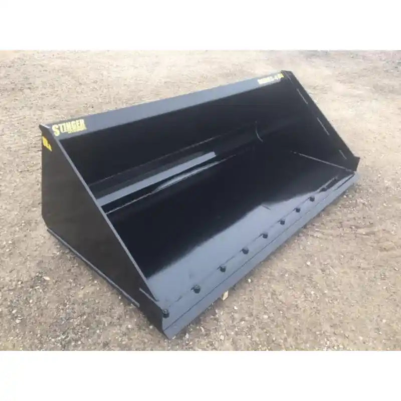 Front-left angled view of black steel skid steer bucket with bolt-on cutting edge on compacted dirt surface