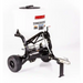 Side angle of Swisher 52-Gallon Tow-Behind Spreader with black frame, pneumatic tires, white hopper, and tow hitch stand, gallery position 1