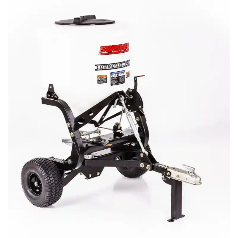 Side angle of Swisher 52-Gallon Tow-Behind Spreader with black frame, pneumatic tires, white hopper, and tow hitch stand, gallery position 1