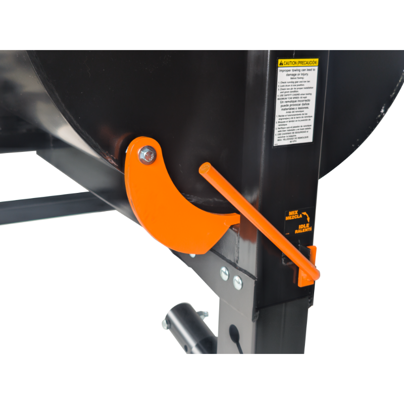 Close-up of black mixer drum with orange metal lever and adjustment handle mounted on steel frame
