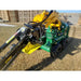 Stinger Attachments BF900 Bigfoot XD skid steer trencher on grass at outdoor storage area, gallery position 4