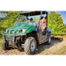 Green utility vehicle with roll cage pulling Swisher 48" Driveway Grader on dirt path, gallery position 1