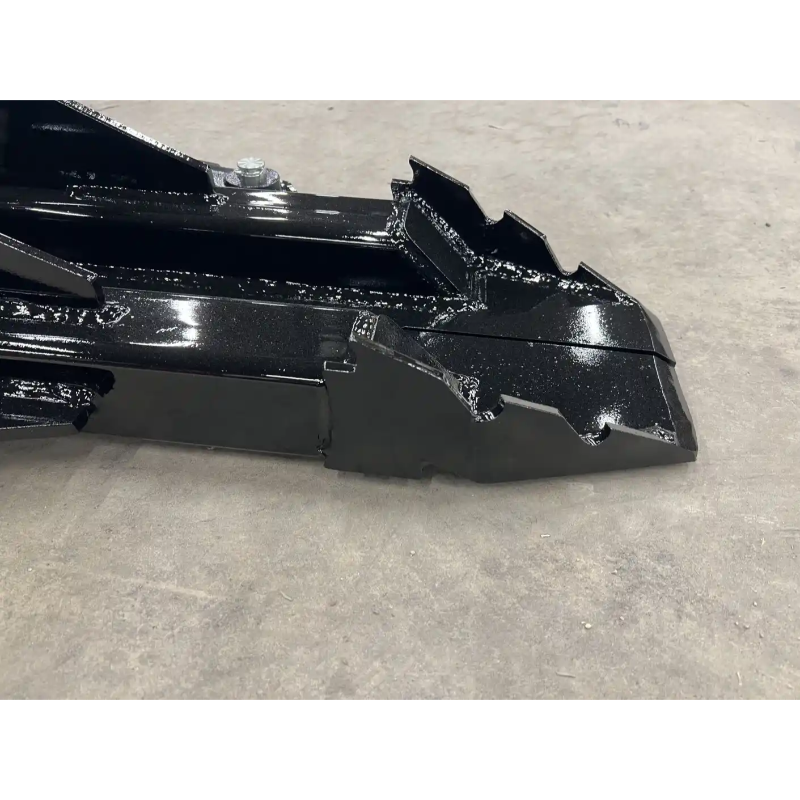 Close-up of Stinger Attachments STP Skid Steer Tree Puller edge, black finish, gallery position 4, 800x800 square image