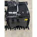 Black steel skid steer root grapple attachment with hydraulics, solid side panels, and serrated tines on concrete floor