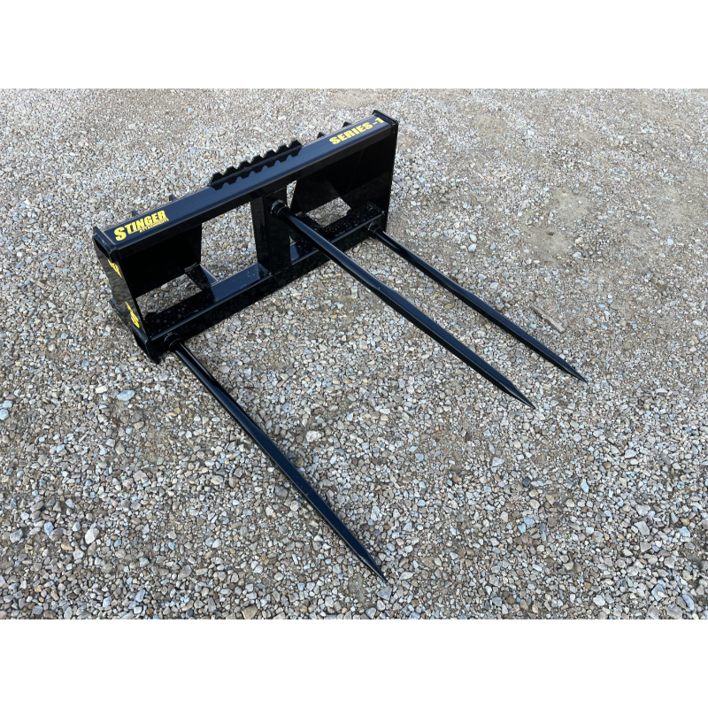 Stinger Attachments BS1 Series 1 Skid Steer Bale Spear with three 49-inch spears on gravel ground, gallery 1 view