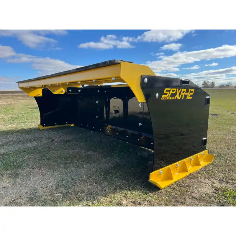 Black and yellow steel snow pusher attachment with reinforced cutting edge and mounting brackets on grass field