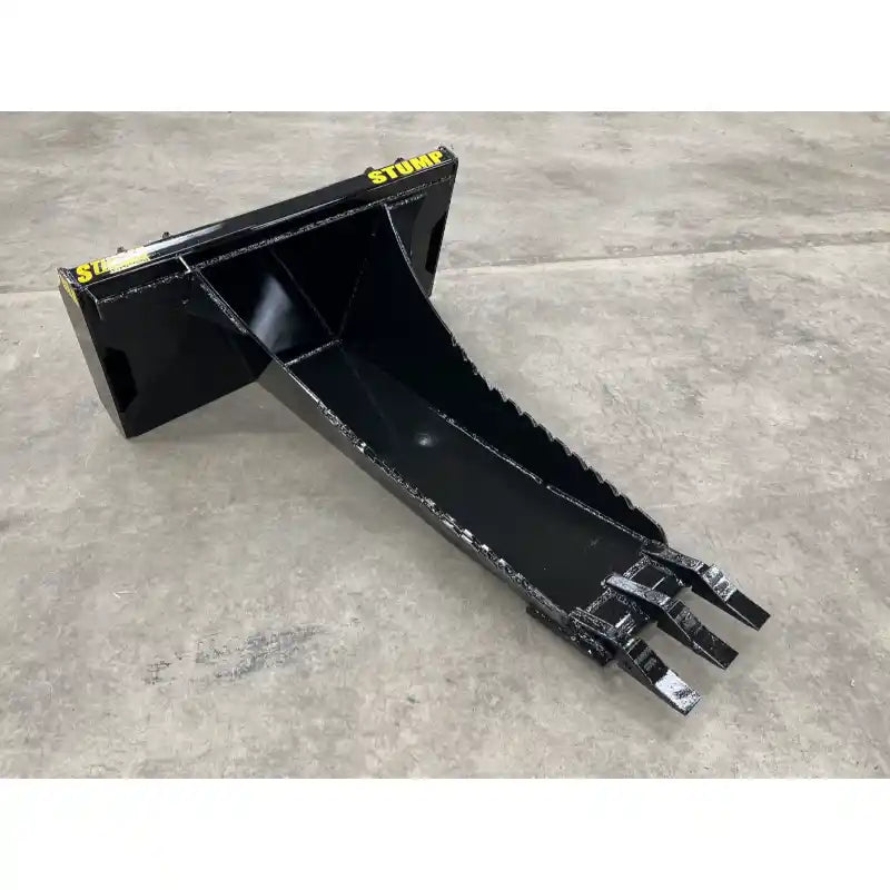 Black steel stump bucket attachment with tapered body and three digging teeth on concrete floor indoors