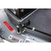 Close-up of tow-behind hitch adjustment mechanism and safety labels on Swisher 60-inch finish cut mower, gallery position 1