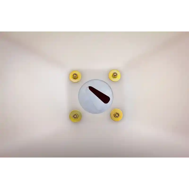 Top view of Swisher ATV Commercial Pro Spreader distribution plate with four yellow fasteners, gallery position 1
