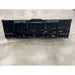 Black steel skid steer material bucket attachment with reinforced center braces and mounting brackets on concrete floor