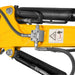 close-up of hydraulic components, hoses, and warning decal on yellow arm of MechMaxx MEC10 mini excavator gallery position 1