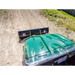Front view of green UTV with black 62-inch Swisher UTV angle plow attached, gallery position 1