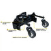 Angled view of black soil conditioner attachment with two large tires, hydraulic components, and removable spoil plates