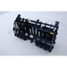Black steel grapple attachment with hydraulic hoses and reinforced bars on concrete floor outdoors