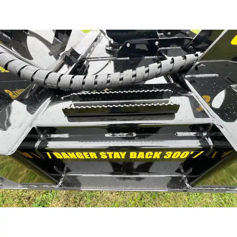 Close-up of Stinger Attachments TF4 Twister skid steer brush cutter deck with warning label, gallery position 1, 800x800px square image