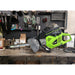 GeoRipper GR520 handheld mini trencher with 20-inch chain and green frame resting on workshop bench gallery position 1