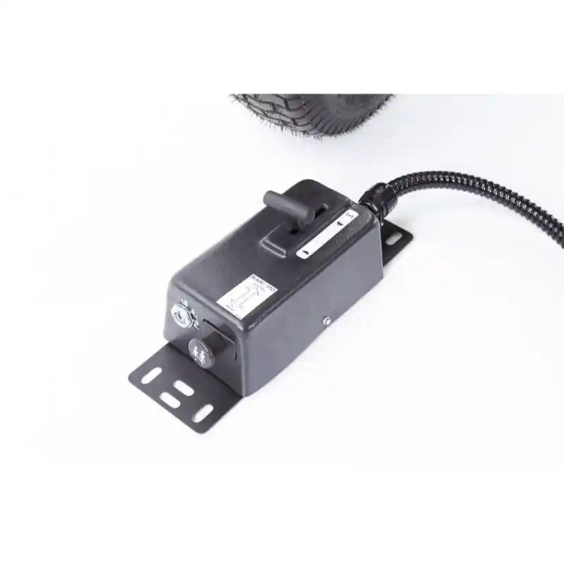 Close-up of black metal throttle control box with lever and wiring harness, gallery position 1 on Swisher brush cutter