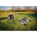 Rear view of operator on zero-turn mower towing Swisher 60-inch finish cut mower with 15.5HP engine, gallery position 1