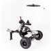 Side perspective of Swisher 52-Gallon Tow-Behind Spreader with white hopper, metal frame, pneumatic tires, and hitch assembly, gallery 1.