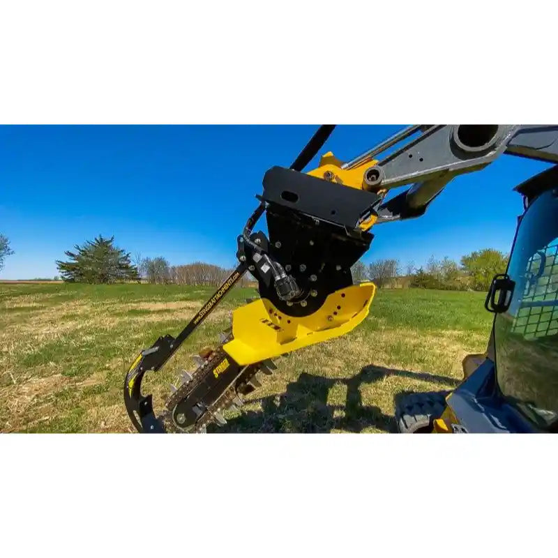Stinger Attachments BF Bigfoot 900 skid steer trencher in field, gallery image 2, square 800x800 dimensions
