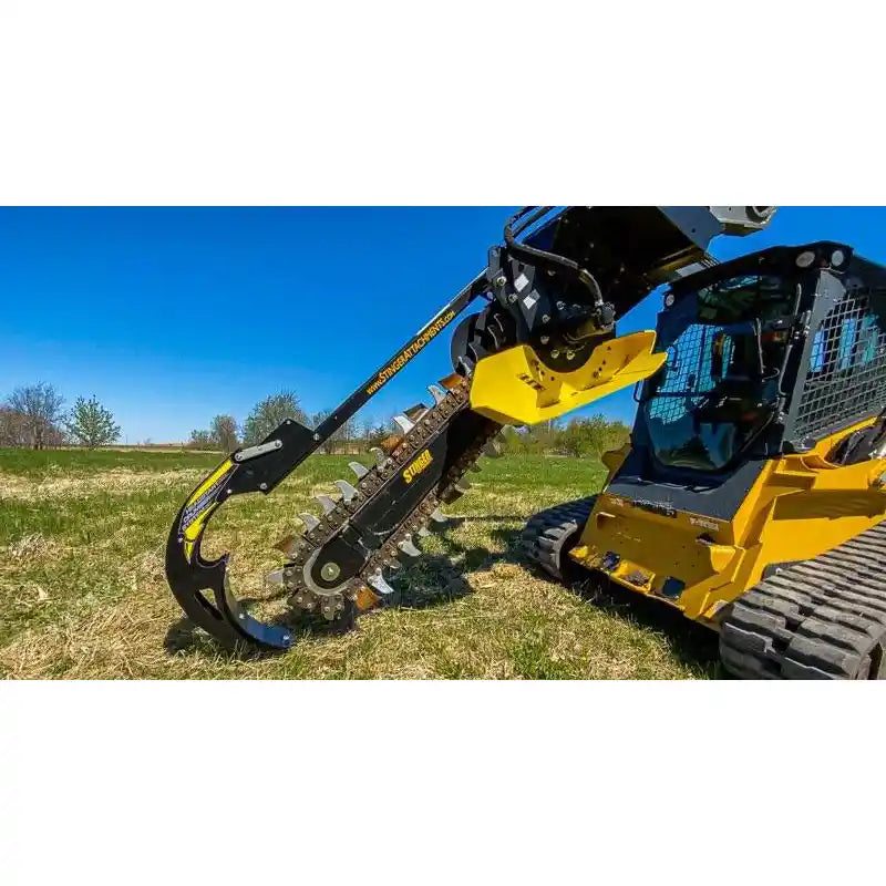 Stinger Attachments BF Bigfoot 900 Skid Steer Trencher mounted on yellow skid steer, gallery image 3, 800x800 square