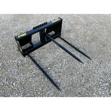 Stinger Attachments BS1 Series 1 Skid Steer Bale Spear with three 49-inch spears on gravel ground, gallery 1 view